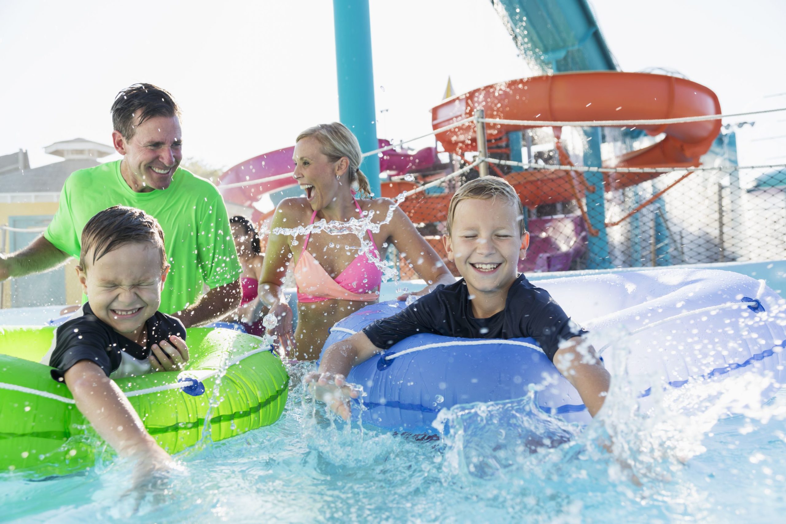 Two boys and family having fun at Schlitterbahn water park